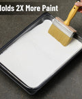 6 Inch Deck Stain Brush For Wood With A Wide Head And Dense Synthetic Bristles dipping in paint tray