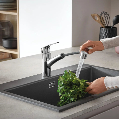 Using Eurosmart Dual Spray Pull Out Kitchen Faucet With Sprayer 1.75 GPM Chrome Durable Stainless on leafy greens in sink.