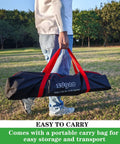 Person holding carry bag for Heavy Duty 7x7ft Portable Baseball And Softball Practice Net for easy transport