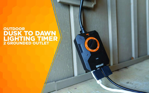 Heavy Duty Outdoor Dusk To Dawn Lighting Timer With Dual Grounded Outlets And Built In Light Sensor, black timer mounted outdoors.
