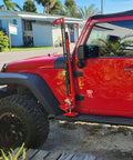 Beefy 48 Inch Ratcheting Off Road Utility Farm Jack, 3 Ton Capacity in use on a red Jeep showing multi-directional lifting