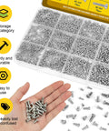 1140 Piece Micro Pan Head Machine Screw Kit For Electronics Eyeglasses Watches And Clocks M1 M1.2 M1.4 M1.6 M1.7 Includes 2 2.5 3 4 5 Millimeter Lengths Fully Threaded Phillips Screws DIY Friendly Handy Electronics Fixer Kit displayed in box with hand holding screws