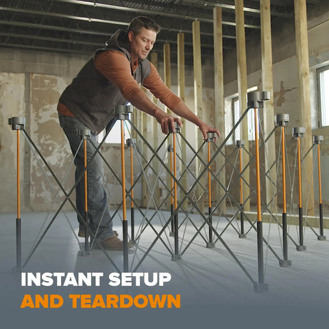 Man setting up Centipede Portable Folding Workbench For Garage With 4500 Lb Capacity, 48 Inch By 72 Inch Sawhorse Style Work Support.