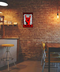 Xanovir Music tin sign on brick wall; red and black rock hand graphic with ROCK text, 8 x 12 inches