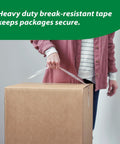 Person carrying box sealed with Heavy Duty Clear Packing Tape Refills, 6 Rolls, Strong Adhesion for Shipping, Moving and Storage