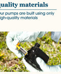 Gloved hands assembling Beefed-Up 500 GPH Fountain Pump With Low Water Shut Off Auto Shut Off To Prevent Burnout 7 Ft Pumping Height Ideal For Large Fountains And Hydroponics outdoors