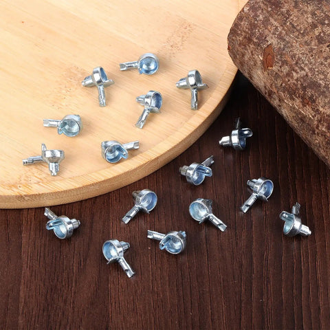 Legit Heavy Duty Zinc Alloy Shelf Pegs Replacement Pins For Classic Modular Bookshelves And Standard Shelving Units on wooden surface.