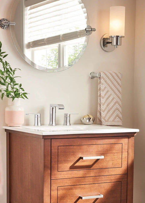 Genta LX Modern Towel Bar 6.8 Inch Chrome For Kitchen Or Bath, mounted beside a mirror with a decorative towel