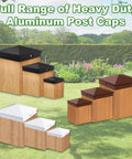 Full range of heavy duty aluminum post caps for wood posts in various colors and sizes displayed on grass background.