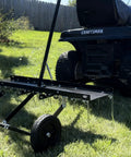 Tow Behind Dethatcher Powerful 40 Inch With 20 Spring Steel Tines Lift Handle attached to mower on lawn