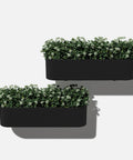 Badass Weatherproof Railing Planter Box With Secure Mounting Bracket Hella Durable Plastic Stone Composite round balcony container filled with flowers.