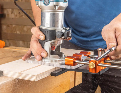 User operating a router with Rock Solid Router Guide Rail Adapter With Swivel Quick Adjust For Curved Arc Projects Universal Fit.