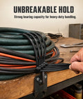 Heavy Duty Self Locking Nylon Cable Ties In Black securing bundled cables on a workbench for effective cable management.