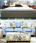 Bedroom and living room set with blue sofa, bed, and matching furniture, showcasing interior design style.