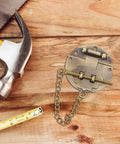 COSMOBETTY 7pcs Vintage Retro Toggle Hasp Latch with Chain for Jewelry Boxes and Collectibles, Iron alloy latch lying on wooden surface.