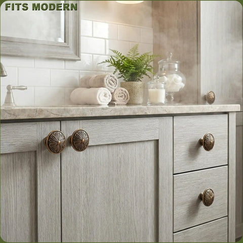 Old School Brass Cabinet Knob Set on light wood cabinet, solid zinc alloy 1.4 inch round handles in bathroom setting