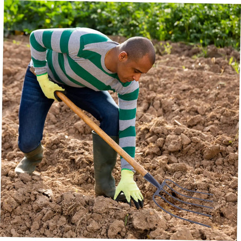 Person using outdoor farm tool manure fork for grass and soil iron all purpose garden fork heavy duty metal pitchfork for yard farm use