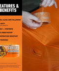 Person using Crystal Clear Heavy Duty Tough As Nails Duct Tape Repair Tape 1.88 Inch By 9 Yard Roll to fix an orange fabric surface.