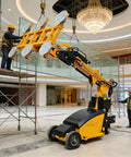 Heavy Duty Electric Glass Vacuum Lifter With Wireless Remote Suction Cup Mechanism moving large glass panels on a construction site.