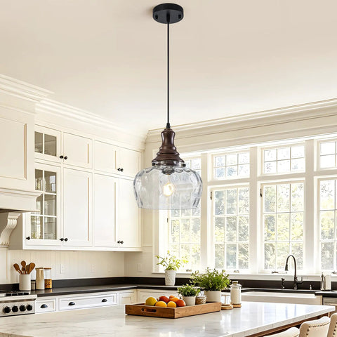 Vintage Glass Pendant Light Kitchen Island with Walnut Wood 9.8in hanging above a white kitchen island countertop with fruits.