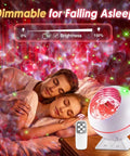 Couple sleeping under Moonlit Galaxy Night Projector For Bedroom With 43 Lighting Modes Dimmable Starlight Sky Projector Remote