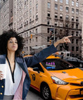 Woman hailing taxi with Dual Color Blue And Pink LED Car Light Sign in urban setting