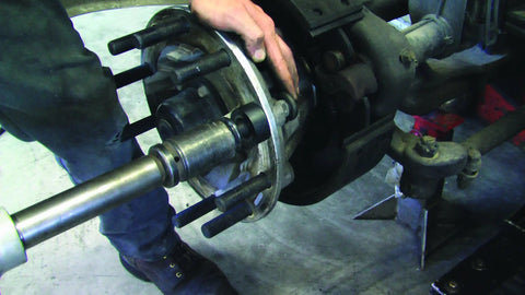 Installation of 22mm truck wheel stud using Truck Wheel Stud Installer Tool For 22mm Studs, Use With Impact Wrench Or Ratchet, Thrust Bearing Assist Pulls New Wheel Stud Into Place, Heavy Duty Vehicle Service Accessory For Quick, Reliable Wheel Maintenance.