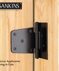 Heavy Duty Gate Hinges Three And A Half Inch Black Iron With Rust Resistant Powder Coat installed on wooden gate