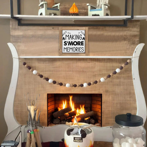 Six Inch Smores Station Sign Wooden Camper Decor for indoor shelf with cozy fire pit setup and marshmallow decor.