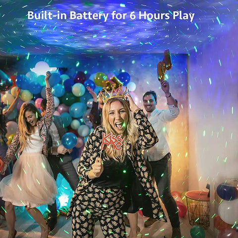 Galaxy Projector Night Light With Remote in use at a vibrant party, projecting starry effects and colorful lights, six-hour battery runtime.