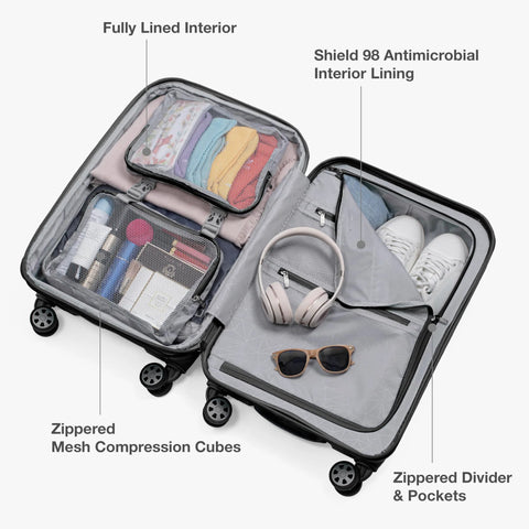Traveler's Choice Pagosa 22-inch black hardshell carry-on luggage, open view with spinner wheels and organized interior.