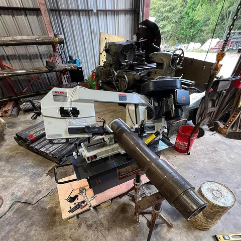 9 Inch Metal Horizontal Band Saw With 9x12 Inch Rectangular Cutting Capacity, cutting large pipe in workshop, Model BS912B