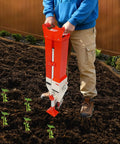 Person using 2 In 1 Seed And Fertilizer Planter For Corn Peanuts And Soybeans Hand Push With Adjustable Depth Manual Sower