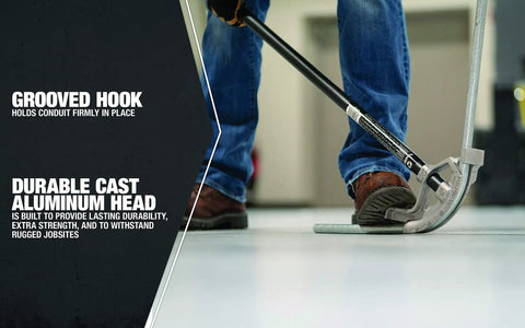Southwire 3/4 Inch Emt Conduit Bender Hand Tool with grooved hook, showing durable aluminum head in use on construction site.