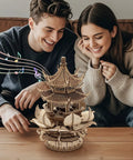 Awesome Wooden 3D Puzzle Lotus Pavilion Music Box Building Kit For Adults With 619 Precisely Cut Parts And Included Tools Wax Sandpaper DIY Wood Craft Gift For Men And Women Creative Assembly Hobby Toy For Mindful Play, couple viewing assembled wooden music box