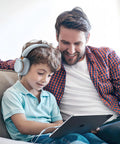 Father and son enjoying music using Premium Usb C To 3.5Mm Audio Adapter With Smart Dac Chip on tablet.