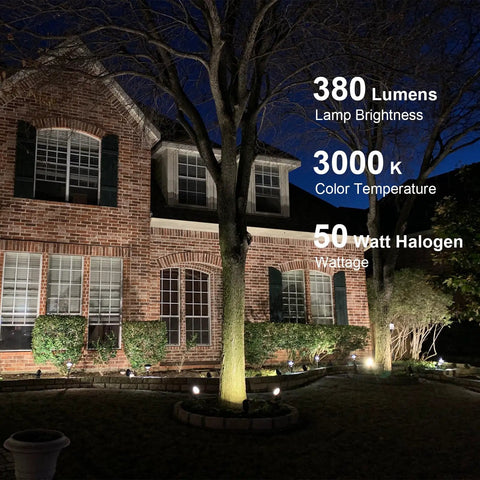8 Pack 50W Low Voltage Backyard Landscape Spotlight Kit With 3000K Warm White Flood Lights illuminating house facade