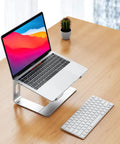 Aluminum Laptop Stand With 6 Inch Elevation, Ergonomic Detachable Notebook Riser, elevating a laptop on a desk, slim silver