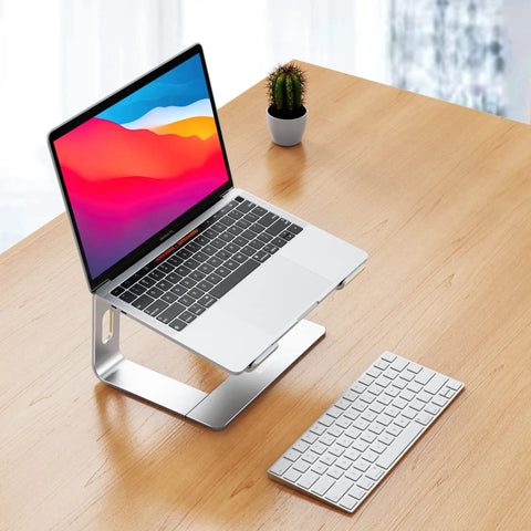 Aluminum Laptop Stand With 6 Inch Elevation, Ergonomic Detachable Notebook Riser, elevating a laptop on a desk, slim silver