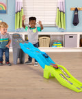 Kids playing with Ultra Durable Dual Track Downhill Raceway With Over 6 Feet Of Indestructible Track For Toddlers And Kids indoors