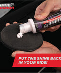 Person applying Car Scratch Remover And Swirl Repair Polish 4oz With Water Repellent Gloss Finish for deep mirror shine on pad