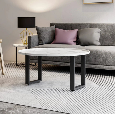 Modern living room with Beefy 16 Inch Steel Table Legs set of 2 for coffee tables, supporting a round white tabletop.