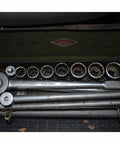 Three Quarter Inch Drive 12 Point Socket Set With Chrome Finish, 25-Piece Includes 20 Standard Sockets, Pro Ratchet, Sliding T-Handle, And 3 Extensions, SureGrip Hex Drive Design, Made In USA in a green case