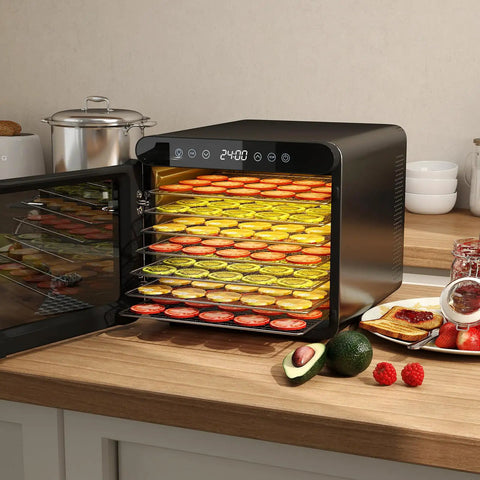 Top Tier Food Dehydrator With Seven Sturdy Stainless Steel Trays And No Sweat One To Twenty Four Hour Timer For Smooth Quiet Jerky Fruit Veggie Herb Treat Drying, showing trays filled with colorful slices on a kitchen counter.