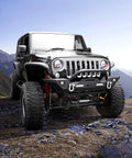 Front view of a black Nilight off-road bumper with winch plate and LED lights on Jeep Wrangler JK/JKU