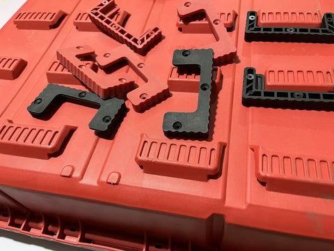 16 Piece Packout Cleats And Feet Kit For Milwaukee System Heavy Duty Mountable Storage Cleats on red surface.