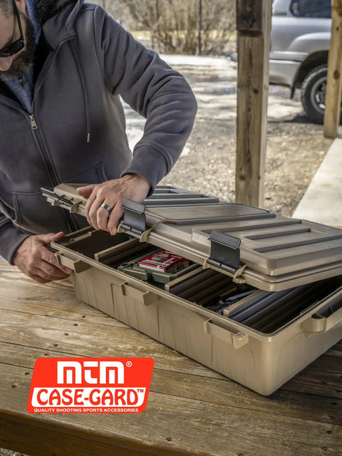 Man with Divided Ammo Crate Utility Box With Seven Compartments Water Resistant And Lockable Ammo Storage For 5.56 9mm 12 Gauge