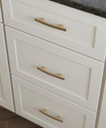 Champagne Bronze Cabinet Handles 3 Inch Center To Center Classic Pulls installed on white kitchen cabinets showing elegant design