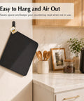 Slide Mat For 9 In 1 TurboBlaze Air Fryer With Anti Slip Base And Hanging Strap, Easy Clean Countertop Protector hanging in kitchen