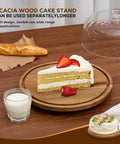 Heavy Duty Acacia Wood Cake Stand With Lid And Rotating Lazy Susan Tray, Smooth Spin Server Dome, cake slice and strawberries on round platter